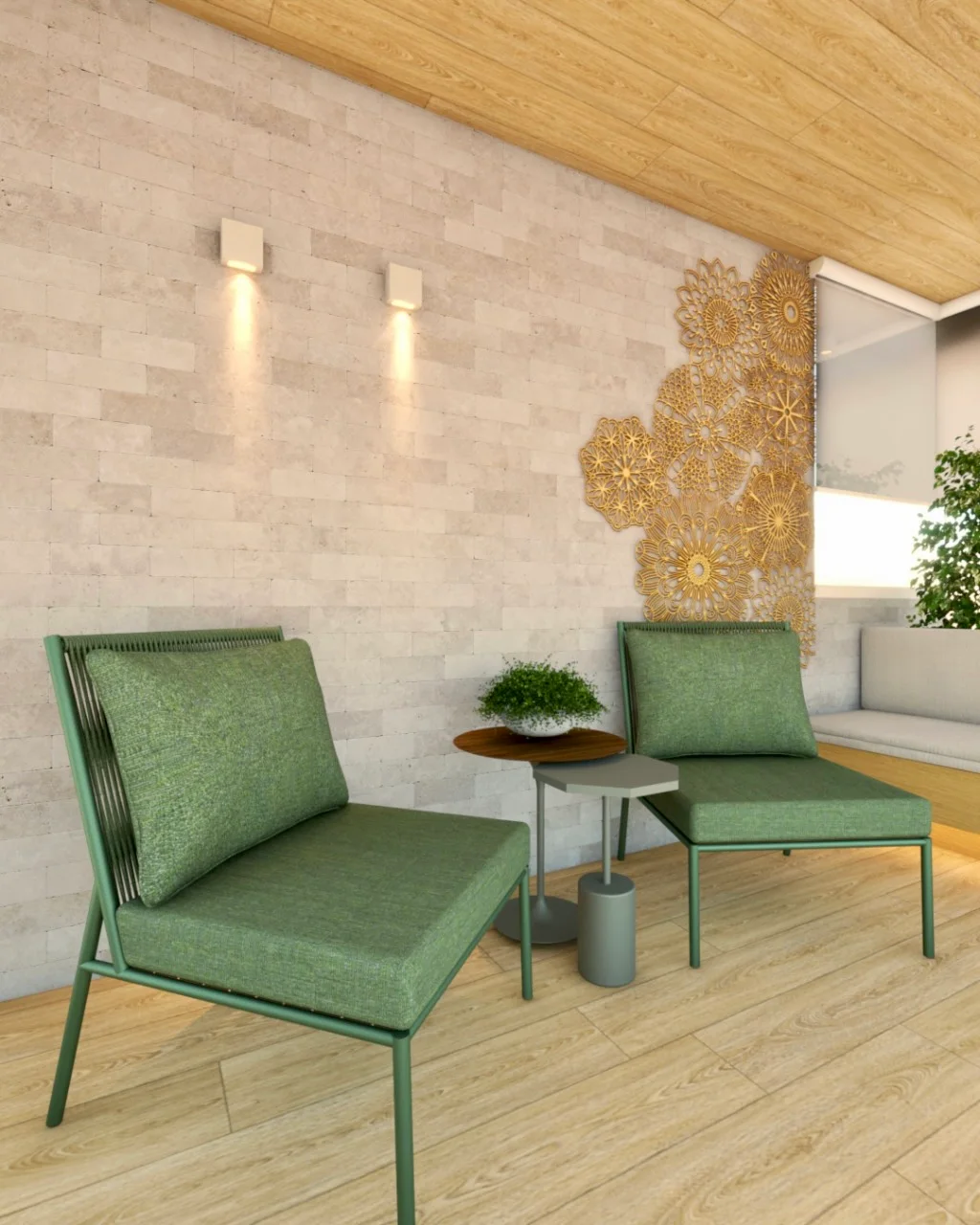 Sala com duas poltronas verdes diante de parede texturizada e detalhe dourado